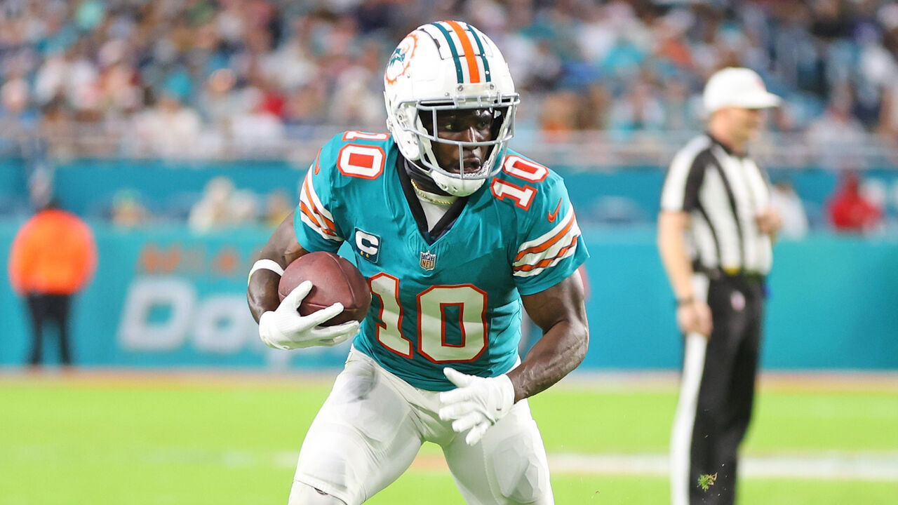 MIAMI GARDENS, FLORIDA - DECEMBER 24: Tyreek Hill #10 of the Miami Dolphins runs for yards during a game against the Dallas Cowboys at Hard Rock Stadium on December 24, 2023 in Miami Gardens, Florida. The Dolphins defeated the Cowboys 22-20.