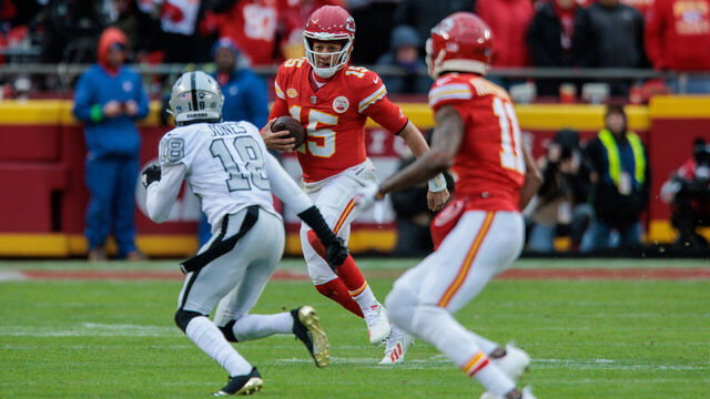 KANSAS CITY, MO - DECEMBER 25: Kansas City Chiefs quarterback Patrick Mahomes (15) scrambles in the back field during the second half against the Las Vegas Raiders on December 25th, 2023 at Arrowhead Stadium in Kansas City, Missouri.
