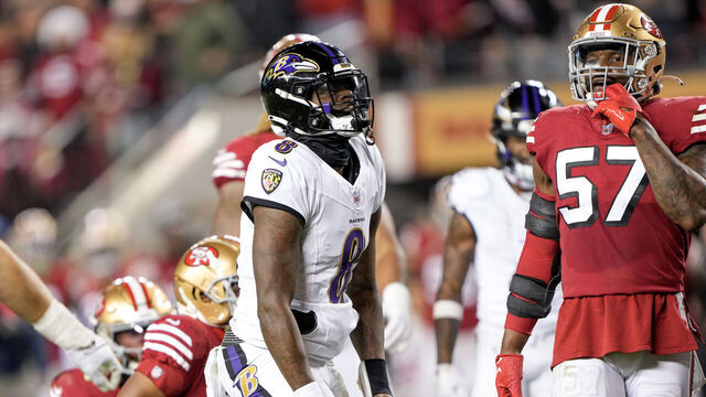 SANTA CLARA, CALIFORNIA - DECEMBER 25: Lamar Jackson #8 of the Baltimore Ravens reacts after a play while Dre Greenlaw #57 of the San Francisco 49ers looks on during the second quarter at Levi's Stadium on December 25, 2023 in Santa Clara, California.