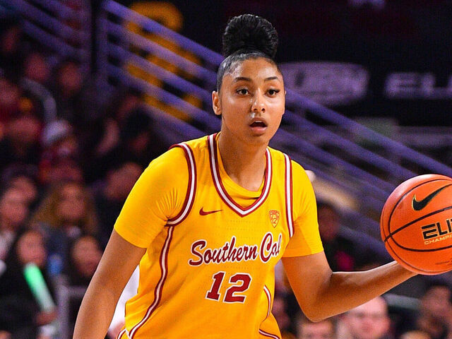 LOS ANGELES, CA - DECEMBER 10: USC Trojans guard JuJu Watkins (12) looks to make a pass during the women's college basketball game between the UC Riverside Highlanders and the USC Trojans on December 10, 2023 at Galen Center in Los Angeles, CA.