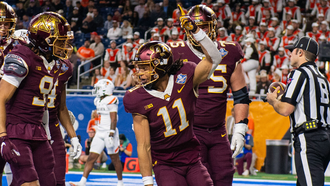 DETROIT, MICHIGAN - DECEMBER 26: Elijah Spencer #11 of the Minnesota Golden Gophers reacts after scoring a touchdown during the first half of the Quick Lane Bowl against the Bowling Green Falcons at Ford Field on December 26, 2023 in Detroit, Michigan.