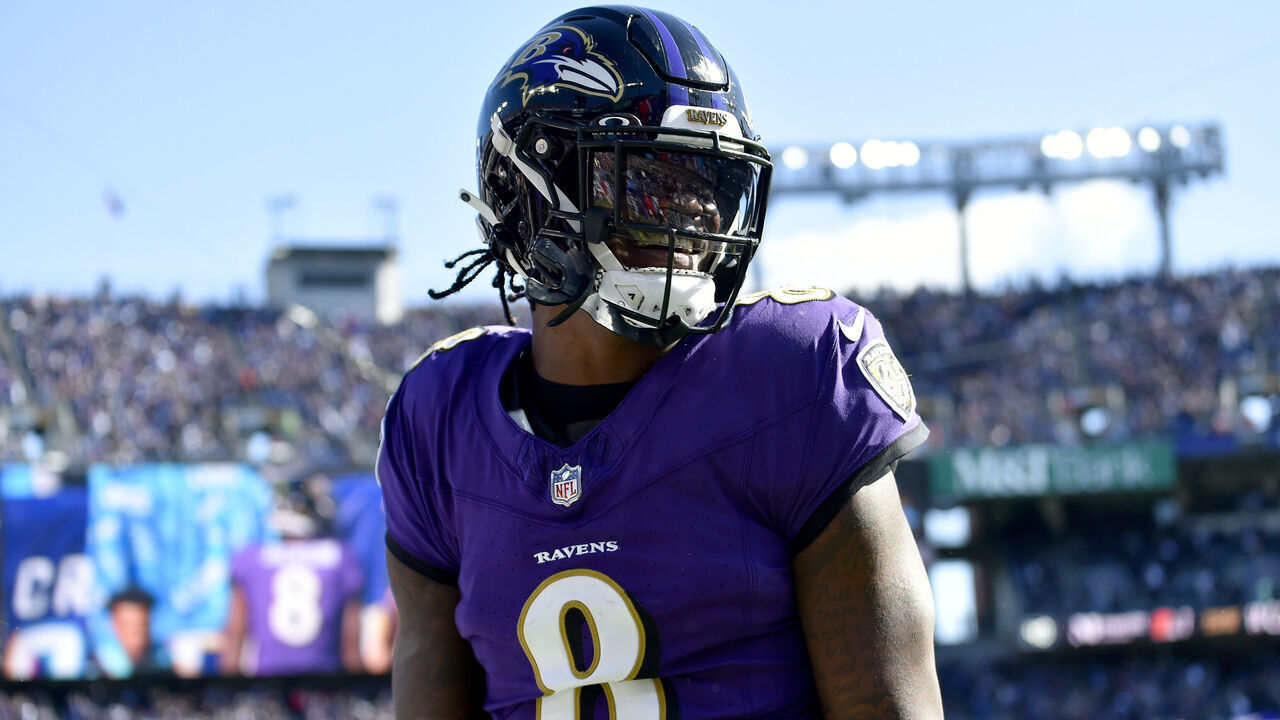 BALTIMORE, MD - OCTOBER 22: Ravens quarterback Lamar Jackson (8) smiles and celebrates after his second quarter touchdown during the Detroit Lions versus Baltimore Ravens NFL game at M&T Bank Stadium on October 22, 2023 in Baltimore, MD.