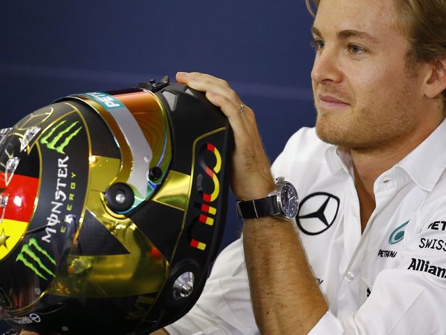 FIFA tells F1 leader Rosberg to ditch German World Cup helmet