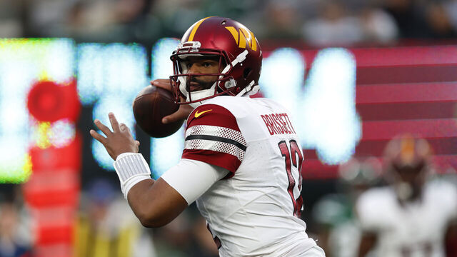 EAST RUTHERFORD, NEW JERSEY - DECEMBER 24: Jacoby Brissett #12 of the Washington Commanders looks to pass during the second half against the New York Jets at MetLife Stadium on December 24, 2023 in East Rutherford, New Jersey.