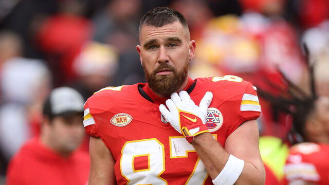 KANSAS CITY, MISSOURI - DECEMBER 25: Travis Kelce #87 of the Kansas City Chiefs warms up prior to a game against the Las Vegas Raiders at GEHA Field at Arrowhead Stadium on December 25, 2023 in Kansas City, Missouri.