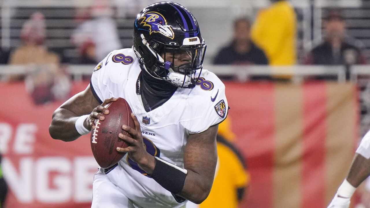 SANTA CLARA, CALIFORNIA - DECEMBER 25: Lamar Jackson #8 of the Baltimore Ravens looks to pass against the San Francisco 49ers during the first half at Levi's Stadium on December 25, 2023 in Santa Clara, California.