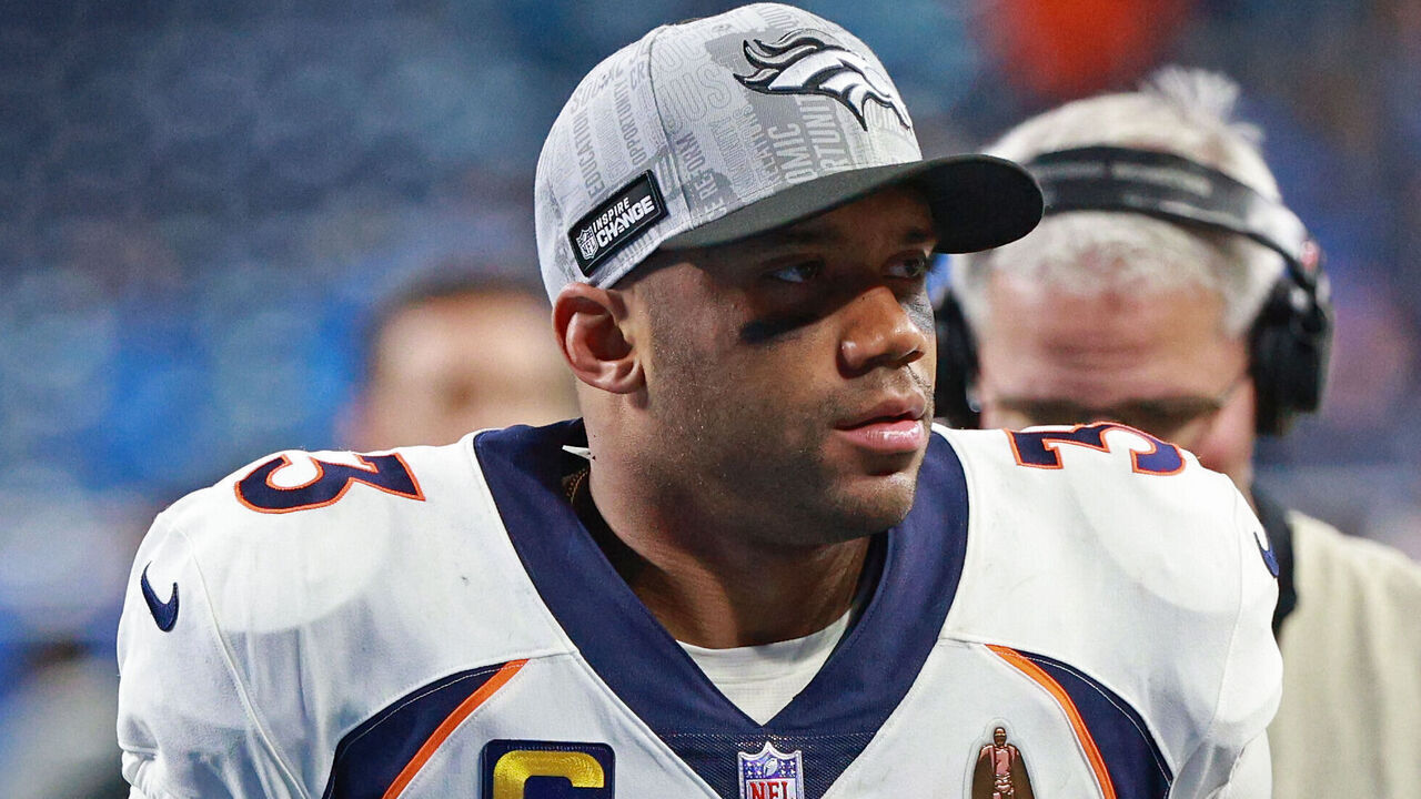 Denver Broncos quarterback Russell Wilson (3) walks off the field after the conclusion of an NFL football game between the Denver Broncos and the Detroit Lions in Detroit, Michigan USA, on Saturday, December 16, 2023.