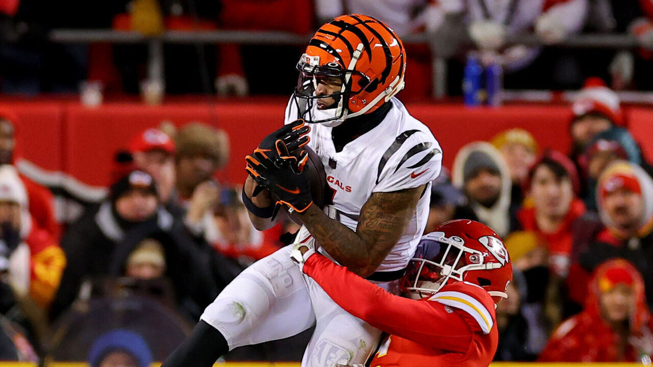 KANSAS CITY, MISSOURI - JANUARY 29: Ja'Marr Chase #1 of the Cincinnati Bengals catches a pass against the Kansas City Chiefs during the fourth quarter in the AFC Championship Game at GEHA Field at Arrowhead Stadium on January 29, 2023 in Kansas City, Missouri.