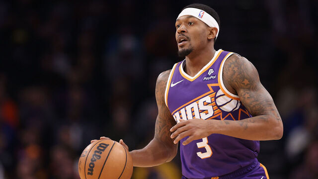 PHOENIX, ARIZONA - DECEMBER 12: Bradley Beal #3 of the Phoenix Suns handles the ball during the first half of the NBA game against the Golden State Warriors at Footprint Center on December 12, 2023 in Phoenix, Arizona.