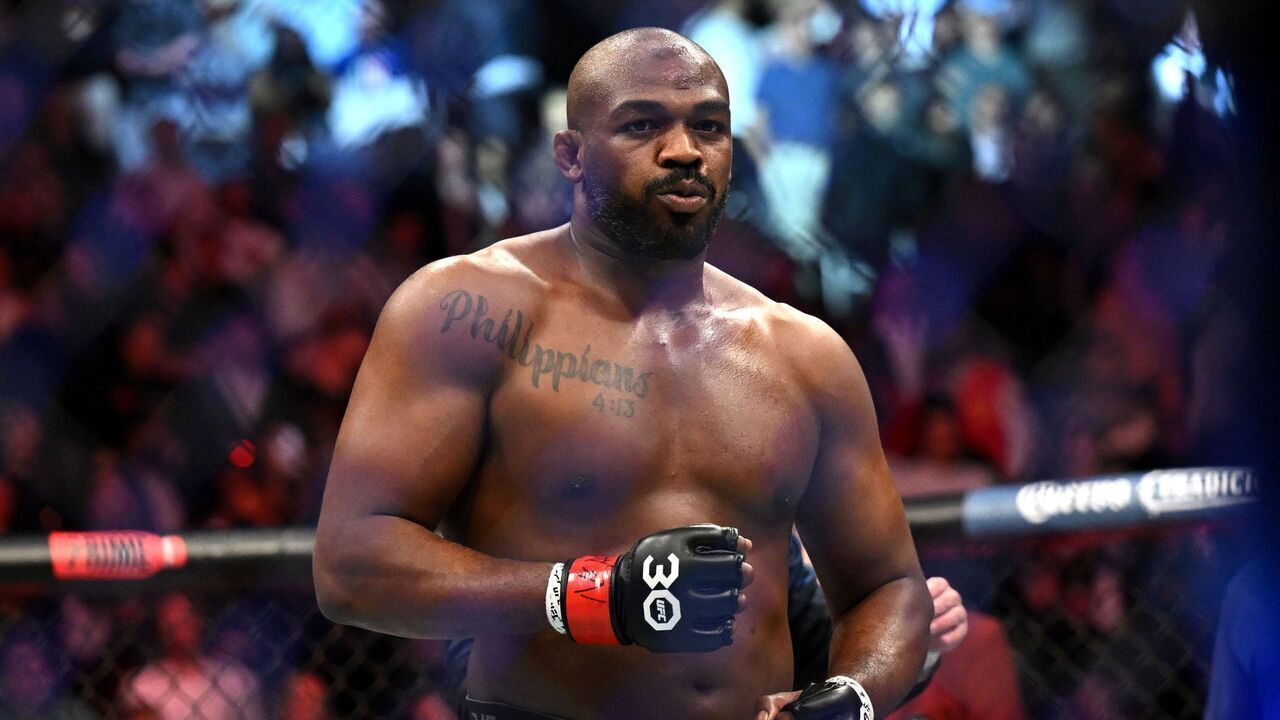 US mixed martial arts fighter Jon Jones celebrates after defeating French mixed martial arts fighter Ciryl Gane during their UFC 285 heavyweight title bout at T-Mobile Arena, in Las Vegas, Nevada, on March 4, 2023.