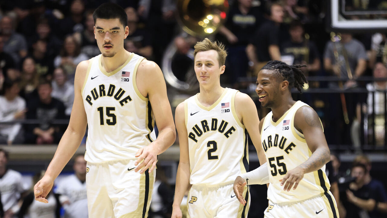 WEST LAFAYETTE, INDIANA - DECEMBER 21: Zach Edey #15, Fletcher Loyer #2 and Lance Jones #55 of the Purdue Boilermakers react during a time out during the second half in the game against the Jacksonville Dolphins at Mackey Arena on December 21, 2023 in West Lafayette, Indiana.