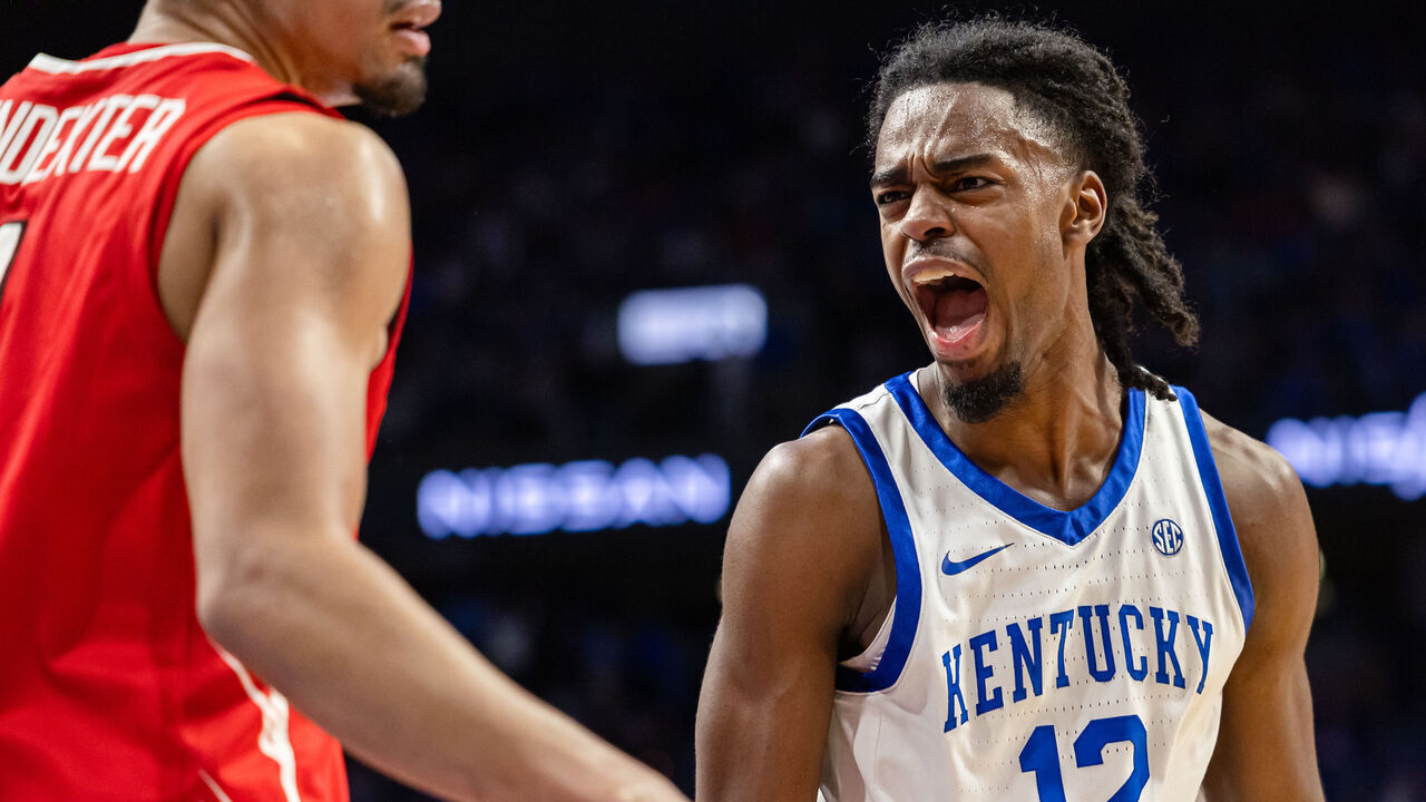 LEXINGTON, KENTUCKY - DECEMBER 29: Antonio Reeves #12 of the Kentucky Wildcats reacts after a dunk during the second half against the Illinois State Redbirds at Rupp Arena on December 29, 2023 in Lexington, Kentucky.