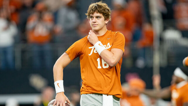ARLINGTON, TX - DECEMBER 02:Texas Longhorns quarterback Arch Manning (16) gets loose before the Big 12 Championship game between the Texas Longhorns and the Oklahoma State Cowboys on December 02, 2023 at AT&T Stadium in Arlington, TX.