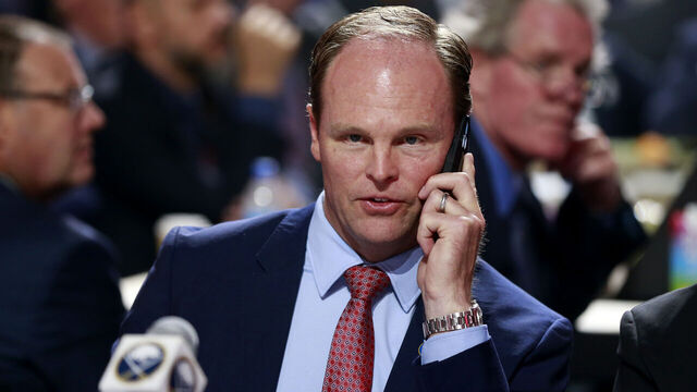 MONTREAL, QUEBEC - JULY 07: Kevyn Adams of the Buffalo Sabres talks on the phone during the first round of the 2022 Upper Deck NHL Draft at Bell Centre on July 07, 2022 in Montreal, Quebec.