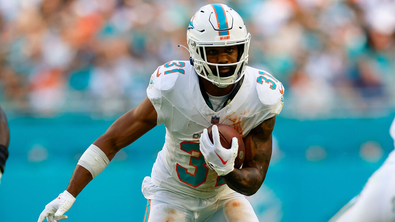 MIAMI GARDENS, FLORIDA - DECEMBER 17: Raheem Mostert #31 of the Miami Dolphins runs with the ball in the first half during a game against the New York Jets at Hard Rock Stadium on December 17, 2023 in Miami Gardens, Florida.