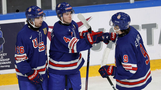 USA's Gavin Brindley (C) celebrates scoring the 2-0 goal with USA's defender Seamus Casey (L) and USA's forward Ryan Leonard during the Group B ice hockey match between USA and Norway of the IIHF World Junior Championship in Gothenburg, Sweden on December 26, 2023.