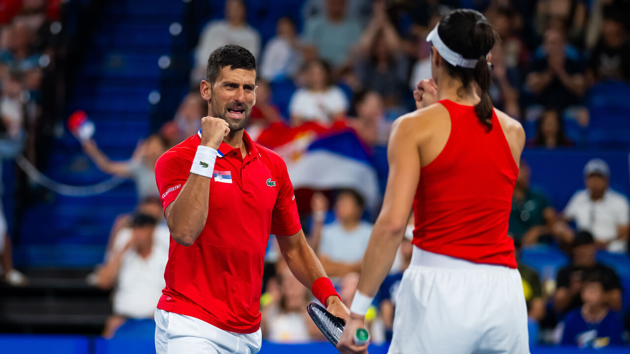 PERTH, AUSTRALIA - DECEMBER 31: Olga Danilovic of Serbia and Novak Djokovic of Serbia play mixed doubles against Qinwen Zheng of China and Zhizhen Zhang of China on Day 3 of the 2024 United Cup at RAC Arena on December 31, 2023 in Perth, Australia