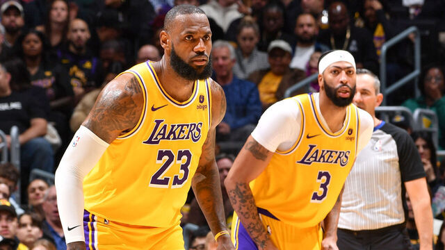 LOS ANGELES, CA - DECEMBER 28: LeBron James #23 of the Los Angeles Lakers & Anthony Davis #3 of the Los Angeles Lakers looks on during the game on December 28, 2023 at Crypto.Com Arena in Los Angeles, California. NOTE TO USER: User expressly acknowledges and agrees that, by downloading and/or using this Photograph, user is consenting to the terms and conditions of the Getty Images License Agreement. Mandatory Copyright Notice: Copyright 2023 NBAE