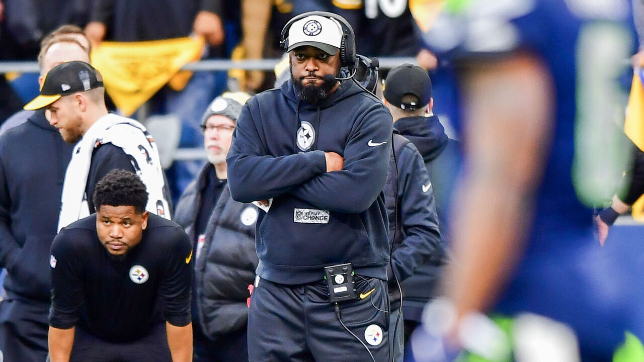 SEATTLE, WASHINGTON - DECEMBER 31: Head coach Mike Tomlin of the Pittsburgh Steelers looks on during the fourth quarter of a game against the Seattle Seahawks at Lumen Field on December 31, 2023 in Seattle, Washington.