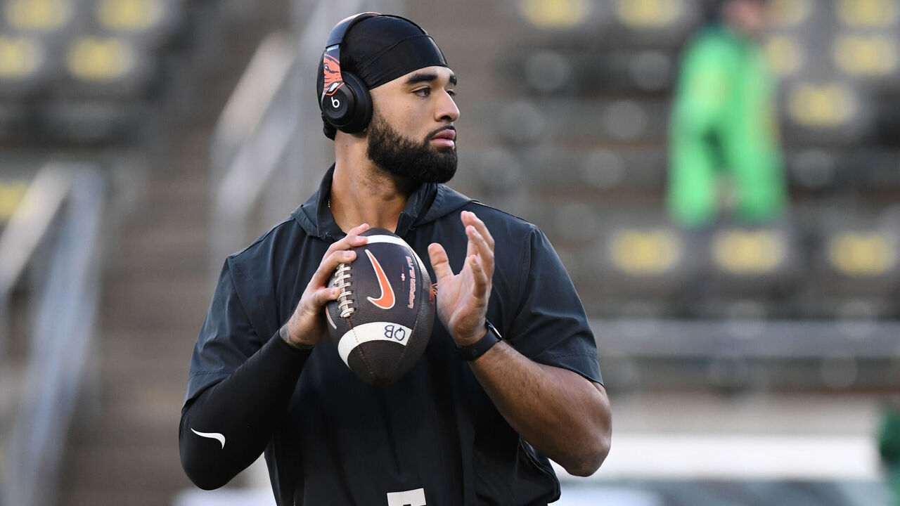 EUGENE, OR - NOVEMBER 24: Oregon State Beavers quarterback DJ Uiagalelei (5) warms up prior to the start of the game during a college football game between the Oregon Ducks and Oregon State Beavers on November 24, 2023, at Autzen Stadium in Eugene, Oregon.
