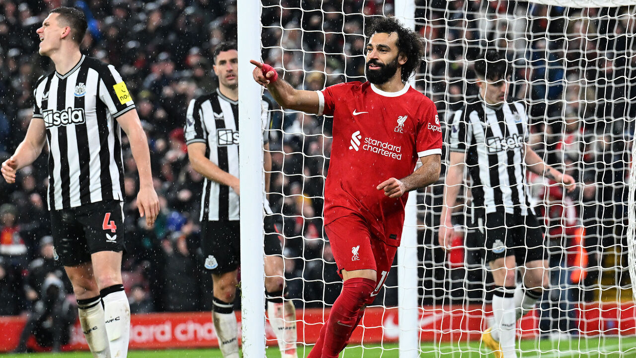 LIVERPOOL, ENGLAND - JANUARY 01:(THE SUN OUT. THE SUN ON SUNDAY OUT) Mohamed Salah of Liverpool celebrates after scoring the opening goal during the Premier League match between Liverpool FC and Newcastle United at Anfield on January 01, 2024 in Liverpool, England.