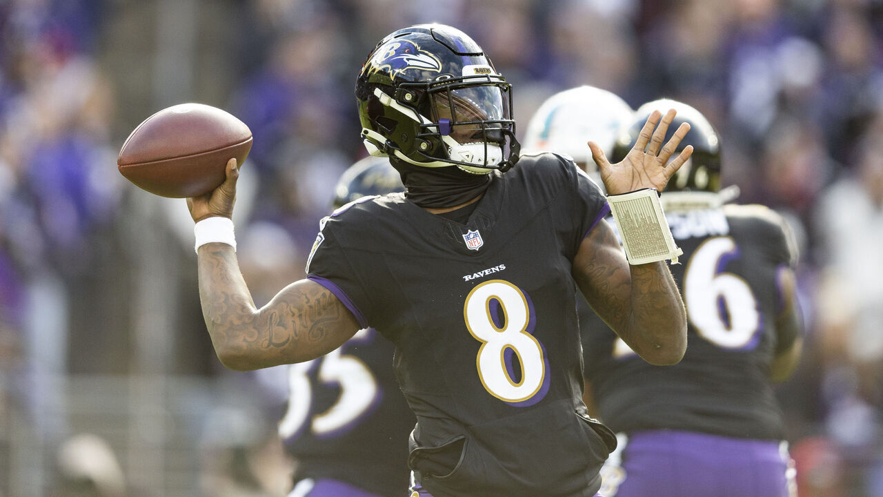 BALTIMORE, MARYLAND - DECEMBER 31: Lamar Jackson #8 of the Baltimore Ravens looks to pass during an NFL football game between the Baltimore Ravens and the Miami Dolphins at M&T Bank Stadium on December 31, 2023 in Baltimore, Maryland.