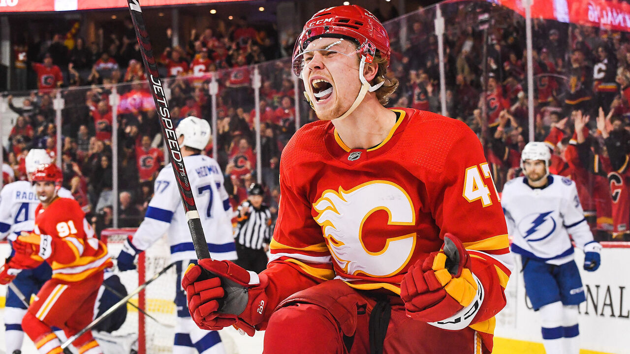 CALGARY, CANADA - DECEMBER 16: Connor Zary #47 of the Calgary Flames celebrates after scoring the Tampa Bay Lightning during the third period an NHL game at Scotiabank Saddledome on December 16, 2023 in Calgary, Alberta, Canada.
