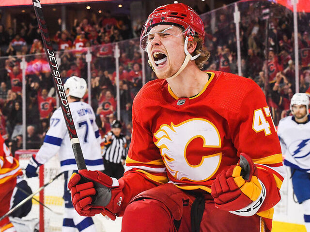 CALGARY, CANADA - DECEMBER 16: Connor Zary #47 of the Calgary Flames celebrates after scoring the Tampa Bay Lightning during the third period an NHL game at Scotiabank Saddledome on December 16, 2023 in Calgary, Alberta, Canada.