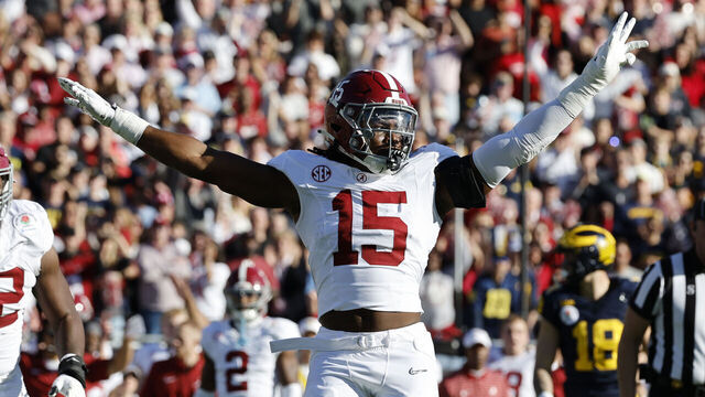 PASADENA, CALIFORNIA - JANUARY 01: Dallas Turner #15 of the Alabama Crimson Tide celebrates in the first quarter against the Michigan Wolverines during the CFP Semifinal Rose Bowl Game at Rose Bowl Stadium on January 01, 2024 in Pasadena, California.