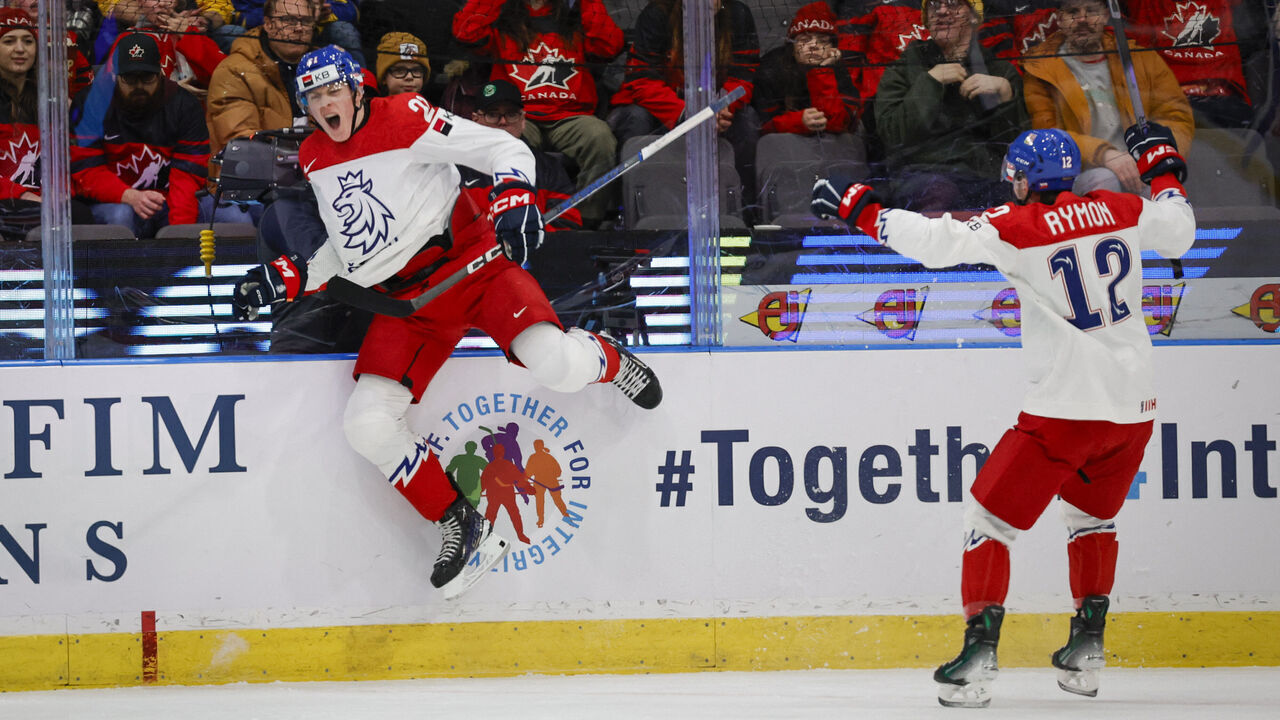 Czechia's Jakub Stancl (L) celebrates scoring the 0-1 goal with teammate Dominik Rymon during the quarter-final match between Canada and Czech Republic of the IIHF World Junior Championship in Gothenburg, Sweden on January 2, 2024.