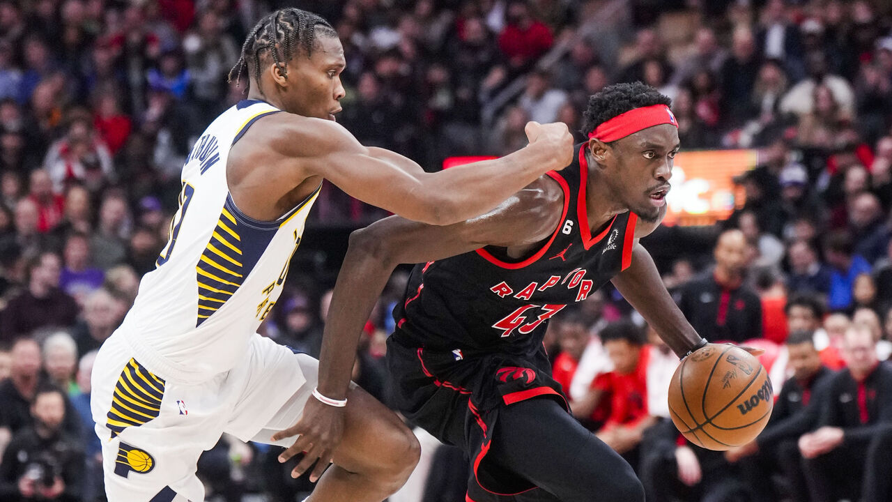 TORONTO, ON - MARCH 22: Pascal Siakam #43 of the Toronto Raptors drives against Bennedict Mathurin #00 of the Indiana Pacers of the Indiana Pacersduring the second half of their basketball game at the Scotiabank Arena on March 22, 2023 in Toronto, Ontario, Canada. NOTE TO USER: User expressly acknowledges and agrees that, by downloading and/or using this Photograph, user is consenting to the terms and conditions of the Getty Images License Agreement.
