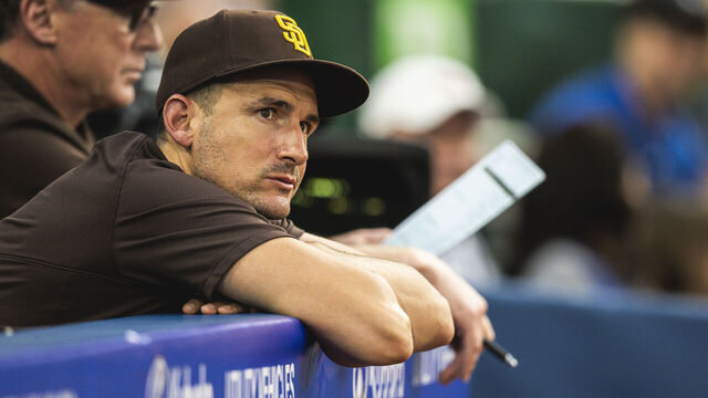TORONTO, CANADA - JULY 18: Padres Bench Coach and Offensive Coordinator Ryan Flaherty #84 stands in the dugout during the game against the Toronto Blue Jays at Rogers Centre on July 18, 2023 in Toronto, Canada.