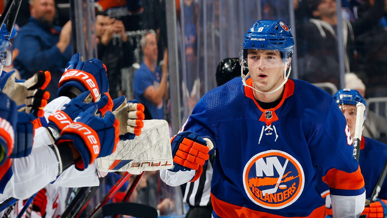 ELMONT, NEW YORK - NOVEMBER 04: Noah Dobson #8 of the New York Islanders celebrates his first period goal against the Carolina Hurricanes at UBS Arena on November 04, 2023 in Elmont, New York.