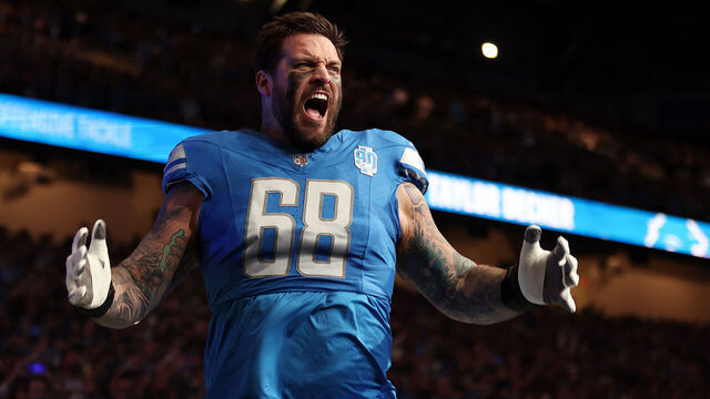 DETROIT, MICHIGAN - NOVEMBER 19: Taylor Decker #68 of the Detroit Lions reacts prior to a game \achi at Ford Field on November 19, 2023 in Detroit, Michigan.