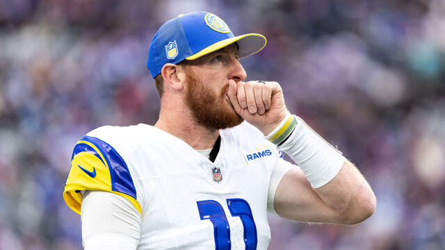 EAST RUTHERFORD, NEW JERSEY - DECEMBER 31: Carson Wentz #11 of the Los Angeles Rams looks on before the game against the New York Giants at MetLife Stadium on December 31, 2023 in East Rutherford, New Jersey.