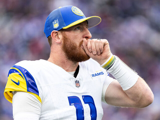EAST RUTHERFORD, NEW JERSEY - DECEMBER 31: Carson Wentz #11 of the Los Angeles Rams looks on before the game against the New York Giants at MetLife Stadium on December 31, 2023 in East Rutherford, New Jersey.