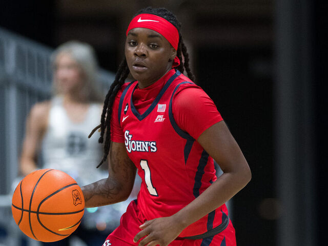 INDIANAPOLIS, IN - DECEMBER 02: St. John's Red Storm guard Unique Drake (1) brings the ball up the court during the women's college basketball game between the Butler Bulldogs and St. Johns Red Storm on December 2, 2022, at Hinkle Fieldhouse in Indianapolis, IN.