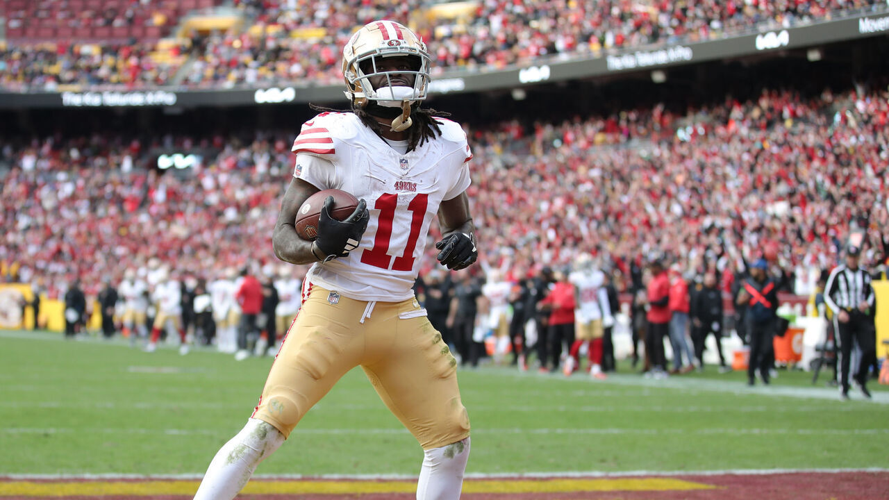 LANDOVER, MD - DECEMBER 31: Brandon Aiyuk #11 of the San Francisco 49ers makes a 17-yard touchdown catch during the game against the Washington Commanders at FedEx Field on December 31, 2023 in Landover, Maryland. The 49ers defeated the Commanders 27-10.