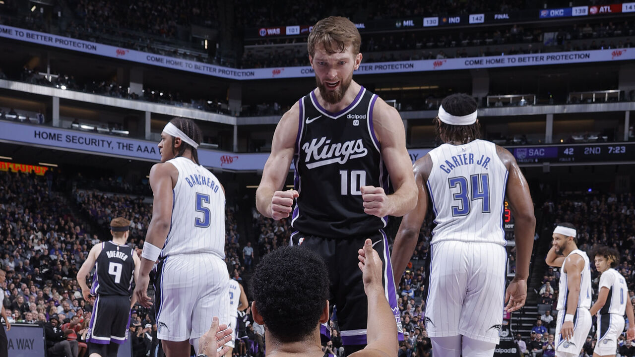 SACRAMENTO, CA - JANUARY 3: Domantas Sabonis #10 celebrates with Trey Lyles #41 of the Sacramento Kings during the game against the Orlando Magic on January 3, 2024 at Golden 1 Center in Sacramento, California. Mandatory Copyright Notice: Copyright 2024 NBAE