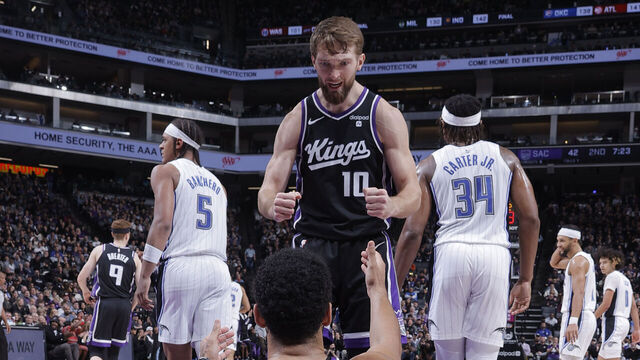 SACRAMENTO, CA - JANUARY 3: Domantas Sabonis #10 celebrates with Trey Lyles #41 of the Sacramento Kings during the game against the Orlando Magic on January 3, 2024 at Golden 1 Center in Sacramento, California. Mandatory Copyright Notice: Copyright 2024 NBAE