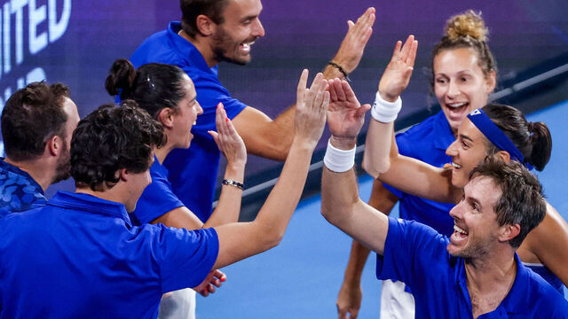 France's Caroline Garcia and Edouard Roger-Vasselin (R) celebrate with teammates after defeating Norway's Casper Ruud and Ulrikke Eikeri during their mixed doubles match at the United Cup tennis event on Ken Rosewall Arena in Sydney on January 4, 2024.
