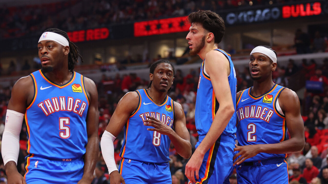CHICAGO, ILLINOIS - OCTOBER 25: Luguentz Dort #5, Jalen Williams #8, Chet Holmgren #7 and Shai Gilgeous-Alexander #2 of the Oklahoma City Thunder look on against the Chicago Bulls during the first half at the United Center on October 25, 2023 in Chicago, Illinois.