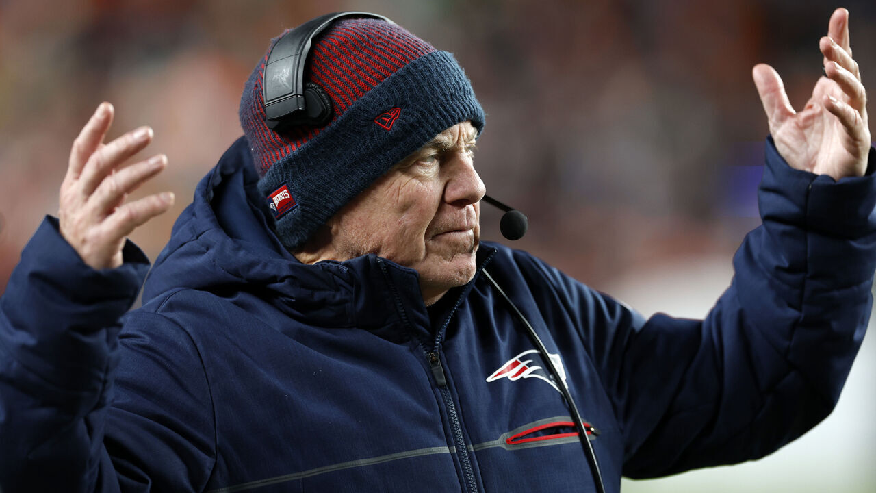 Denver, CO - December 24: New England Patriots head coach Bill Belichick throws his hands up in the second half. The Patriots beat the Denver Broncos, 26-23.