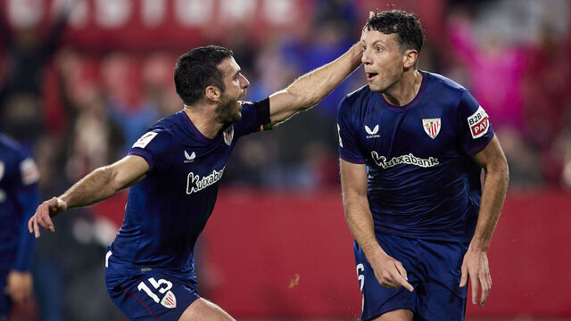 SEVILLE, SPAIN - JANUARY 04: Mikel Vesga of Athletic Club celebrates after scoring their side's first goal with his teammate Inigo Lekue of Athletic Club during the LaLiga EA Sports match between Sevilla FC and Athletic Bilbao at Estadio Ramon Sanchez Pizjuan on January 04, 2024 in Seville, Spain.
