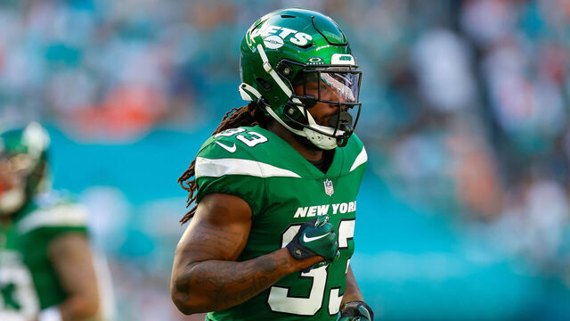 MIAMI GARDENS, FLORIDA - DECEMBER 17: Dalvin Cook #33 of the New York Jets looks on during a game against the Miami Dolphins at Hard Rock Stadium on December 17, 2023 in Miami Gardens, Florida.