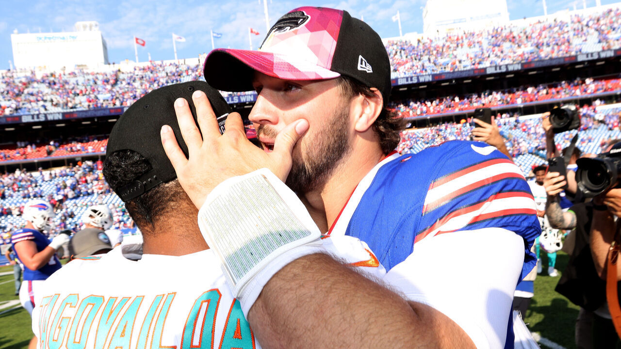 ORCHARD PARK, NEW YORK - OCTOBER 01: Tua Tagovailoa #1 of the Miami Dolphins and Josh Allen #17 of the Buffalo Bills shake hands after the game at Highmark Stadium on October 01, 2023 in Orchard Park, New York.