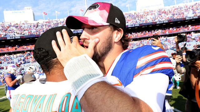 ORCHARD PARK, NEW YORK - OCTOBER 01: Tua Tagovailoa #1 of the Miami Dolphins and Josh Allen #17 of the Buffalo Bills shake hands after the game at Highmark Stadium on October 01, 2023 in Orchard Park, New York.