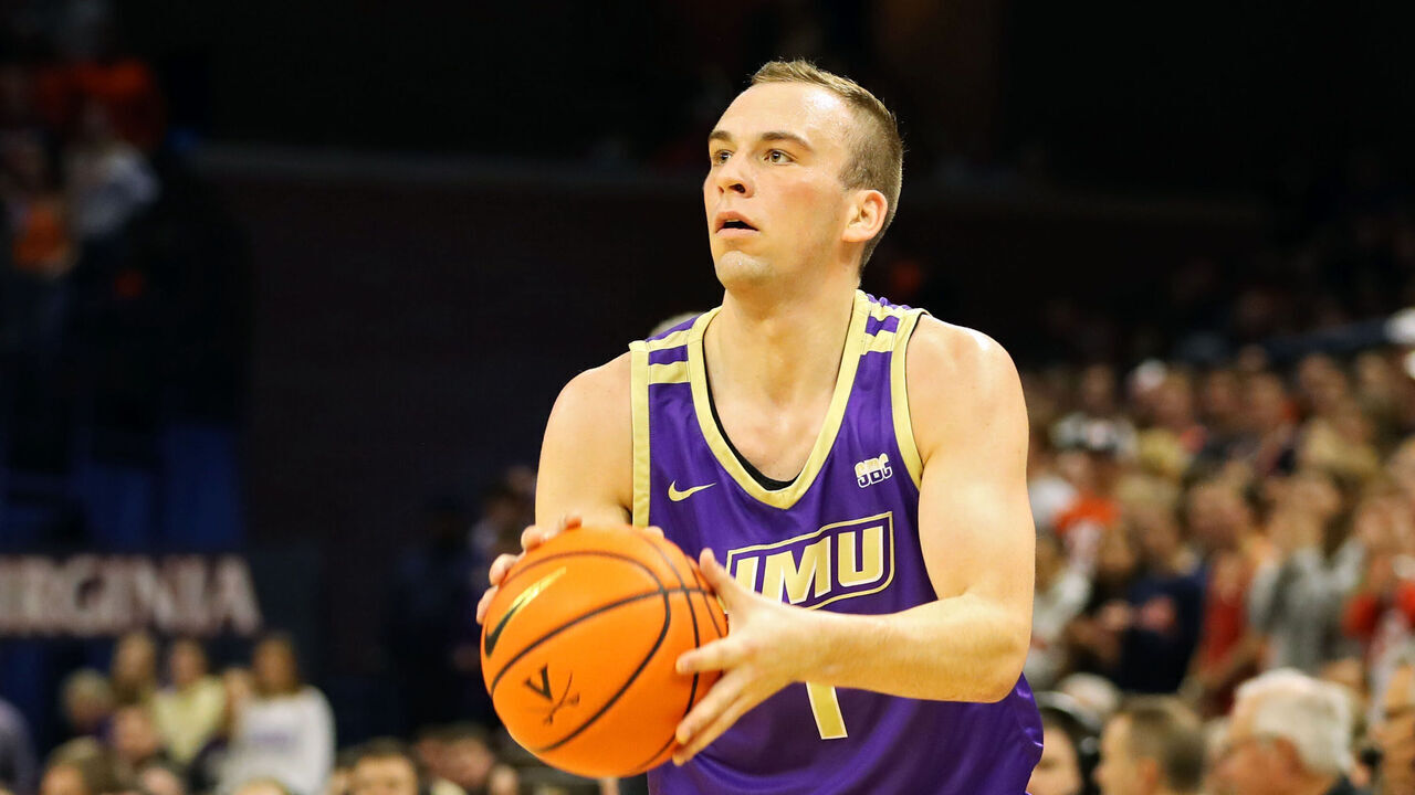 CHARLOTTESVILLE, VA - DECEMBER 06: Noah Freidel #1 of the James Madison Dukes shoots in the first half during a game against the Virginia Cavaliers at John Paul Jones Arena on December 6, 2022 in Charlottesville, Virginia.
