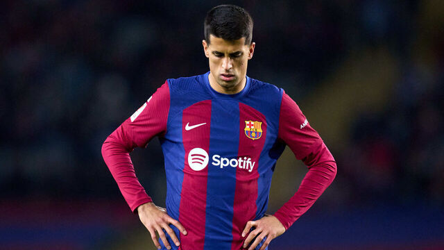 BARCELONA, SPAIN - DECEMBER 20: Joao Cancelo of FC Barcelona looks down during the LaLiga EA Sports match between FC Barcelona and UD Almeria at Estadi Olimpic Lluis Companys on December 20, 2023 in Barcelona, Spain.