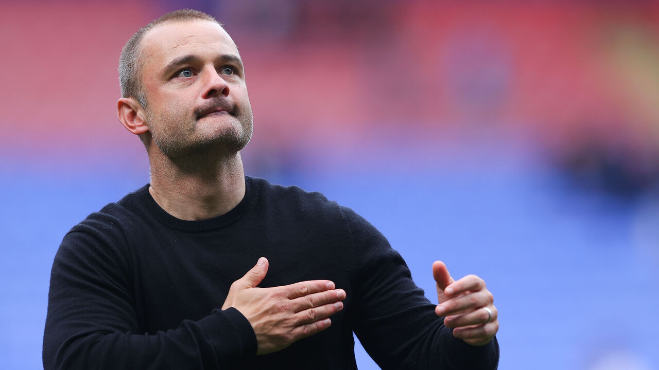 BOLTON, ENGLAND - AUGUST 19: Shaun Maloney, manager of Wigan Athletic, celebrates after the Sky Bet League One match between Bolton Wanderers and Wigan Athletic at University of Bolton Stadium on August 19, 2023 in Bolton, England.